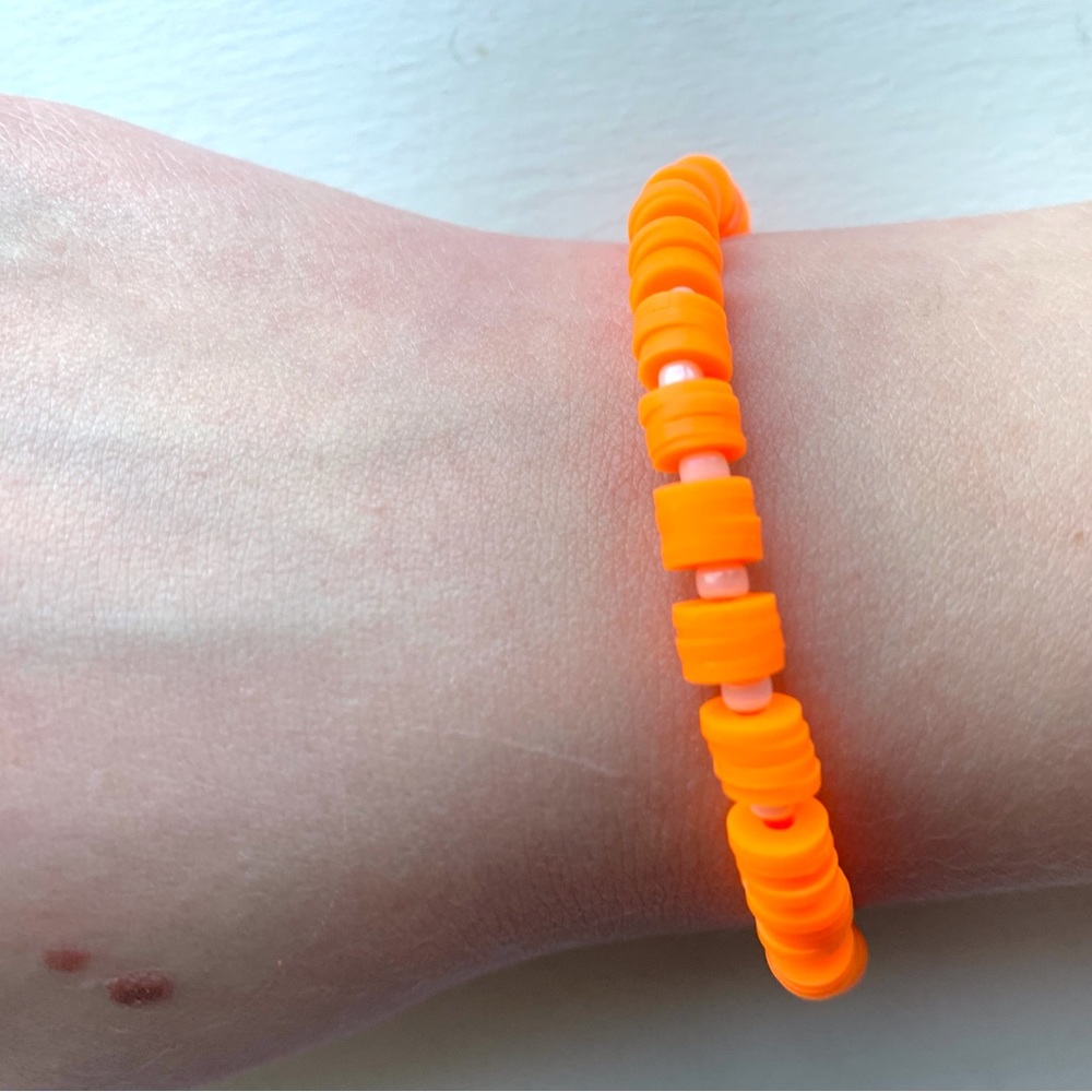 Handmade clay bead bracelet orange beads white seed beads stretch